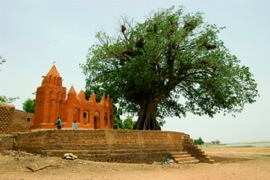 Ancient mosque under baobob tree in Segou Koro